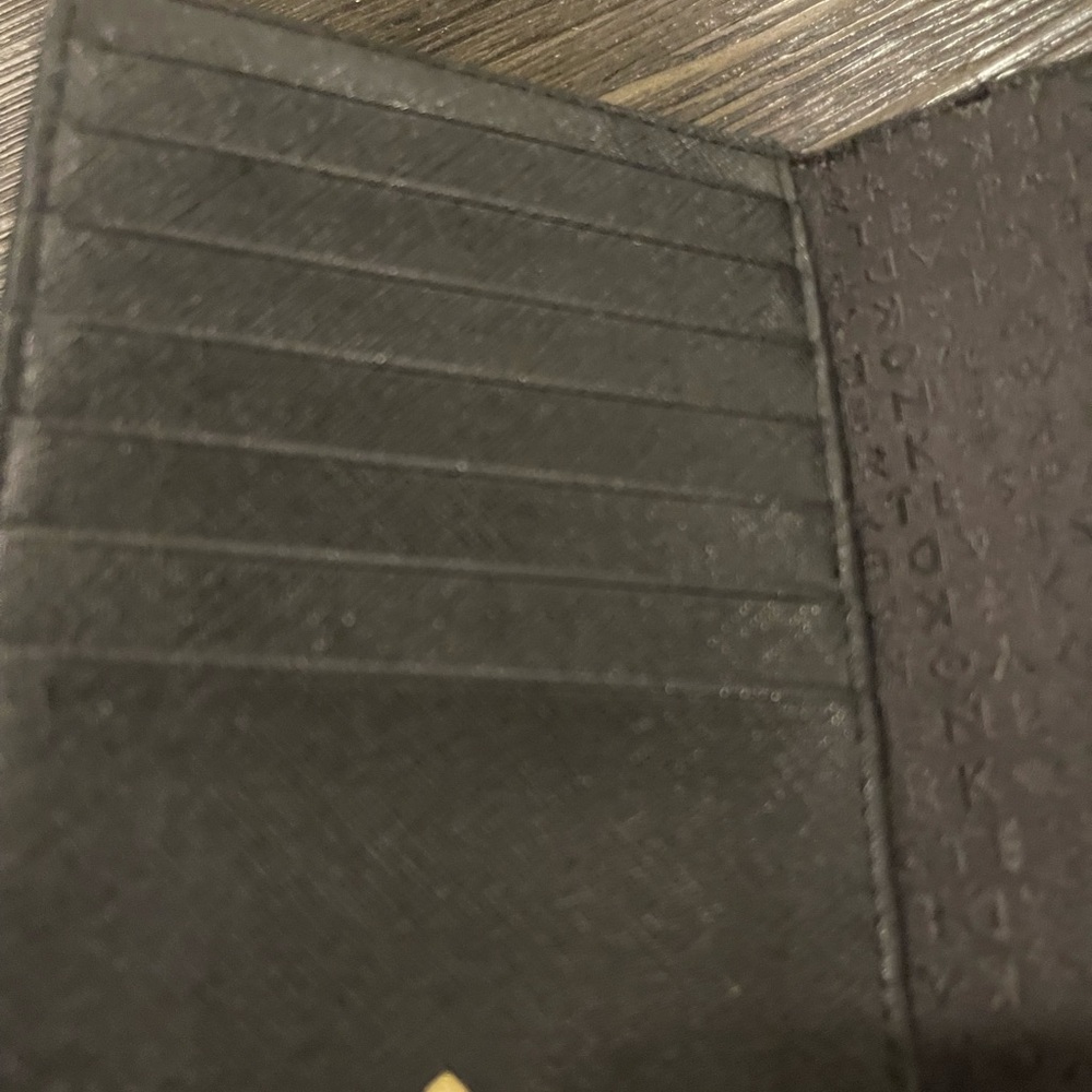 Kate Spade Pink/Blue/Black striped passport Holder
NWOT - Picture 6 of 6